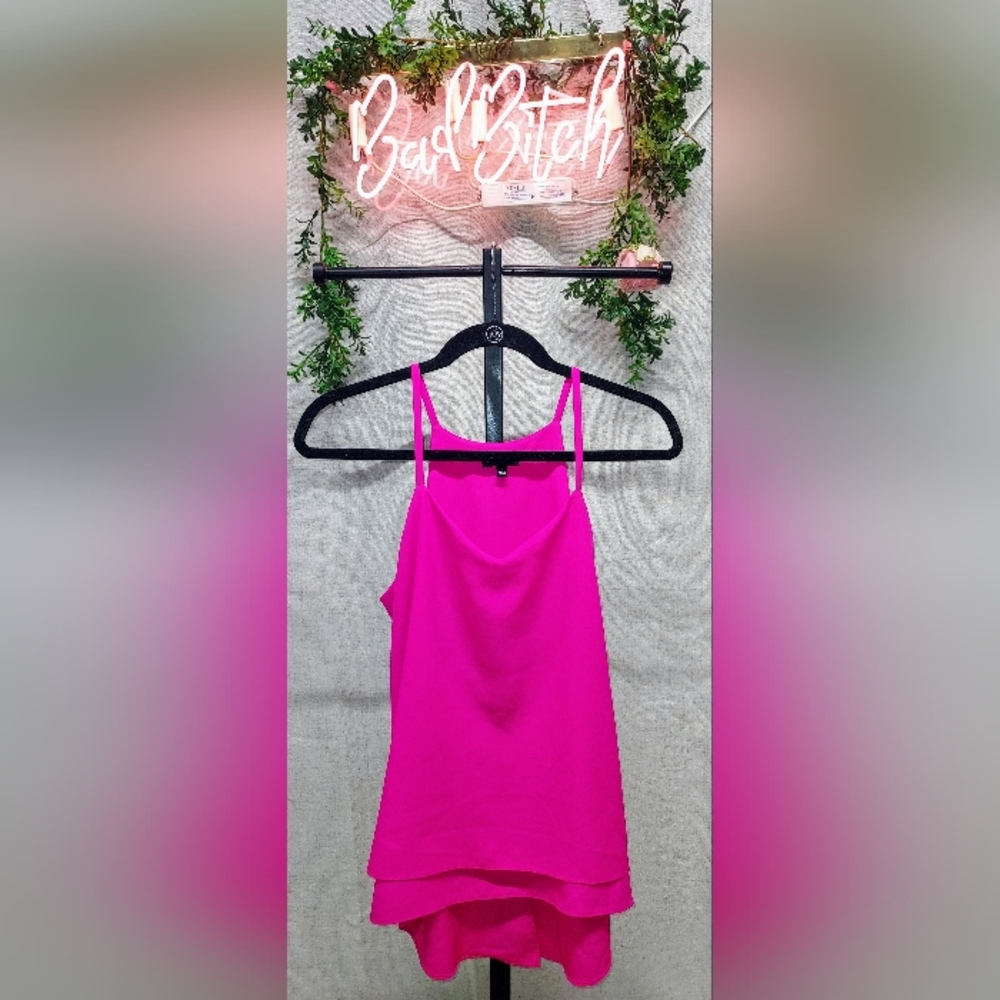 The limited neon pink split back tank top